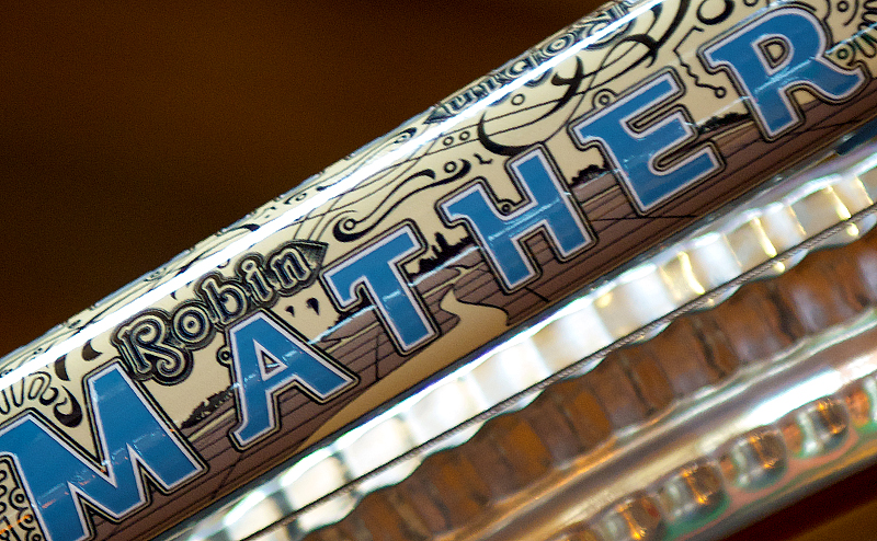 image of the Robin Mather bicycle tube graphic used on a blue bike
