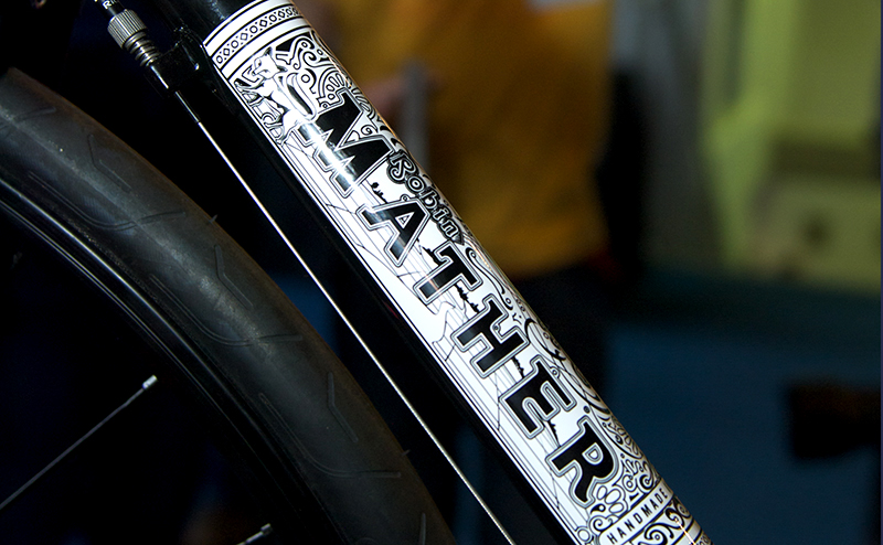 image of the black and white Robin Mather bicycle tube graphic used on a one off Rapha bike